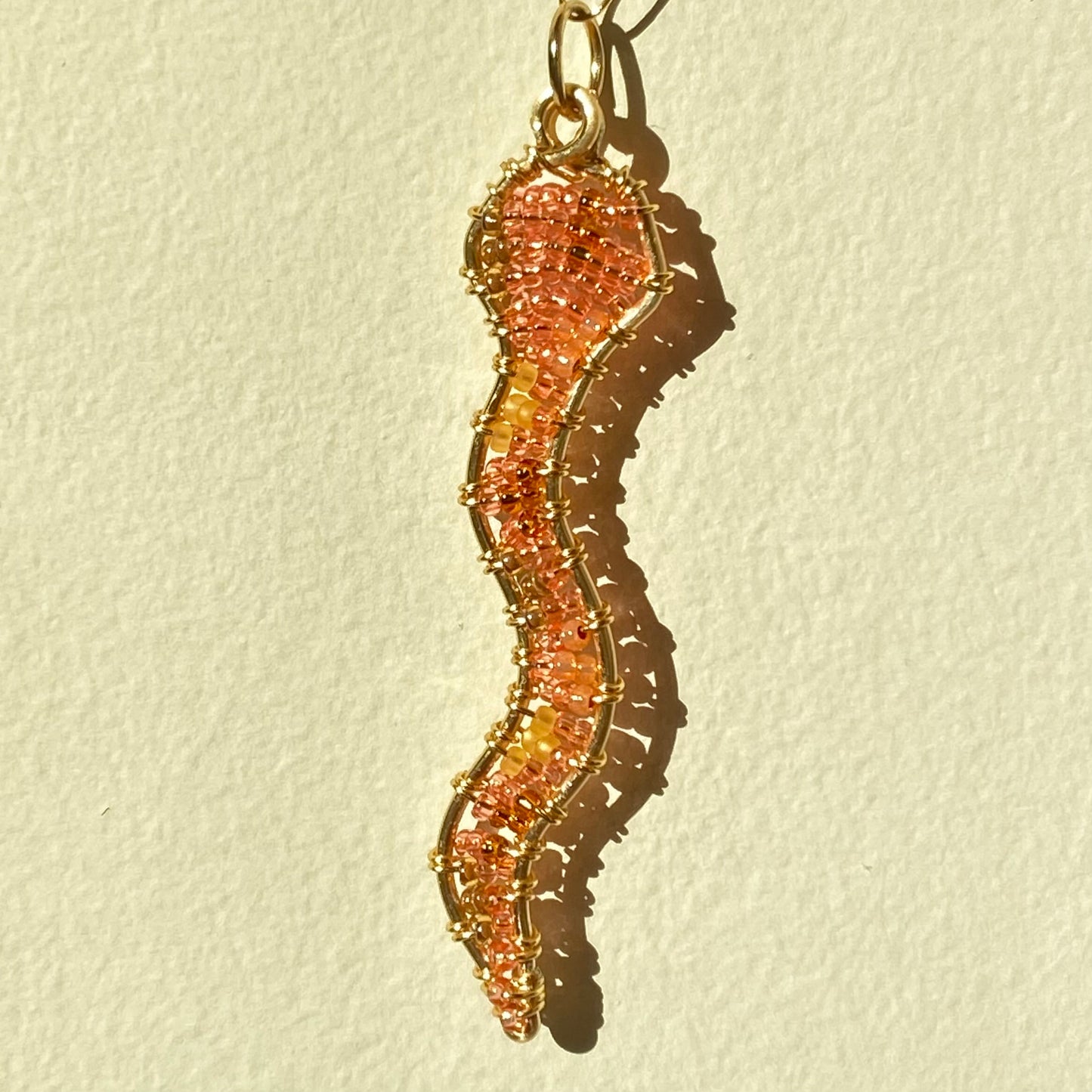 Brown Sugar Peach Snake Beaded Pendants