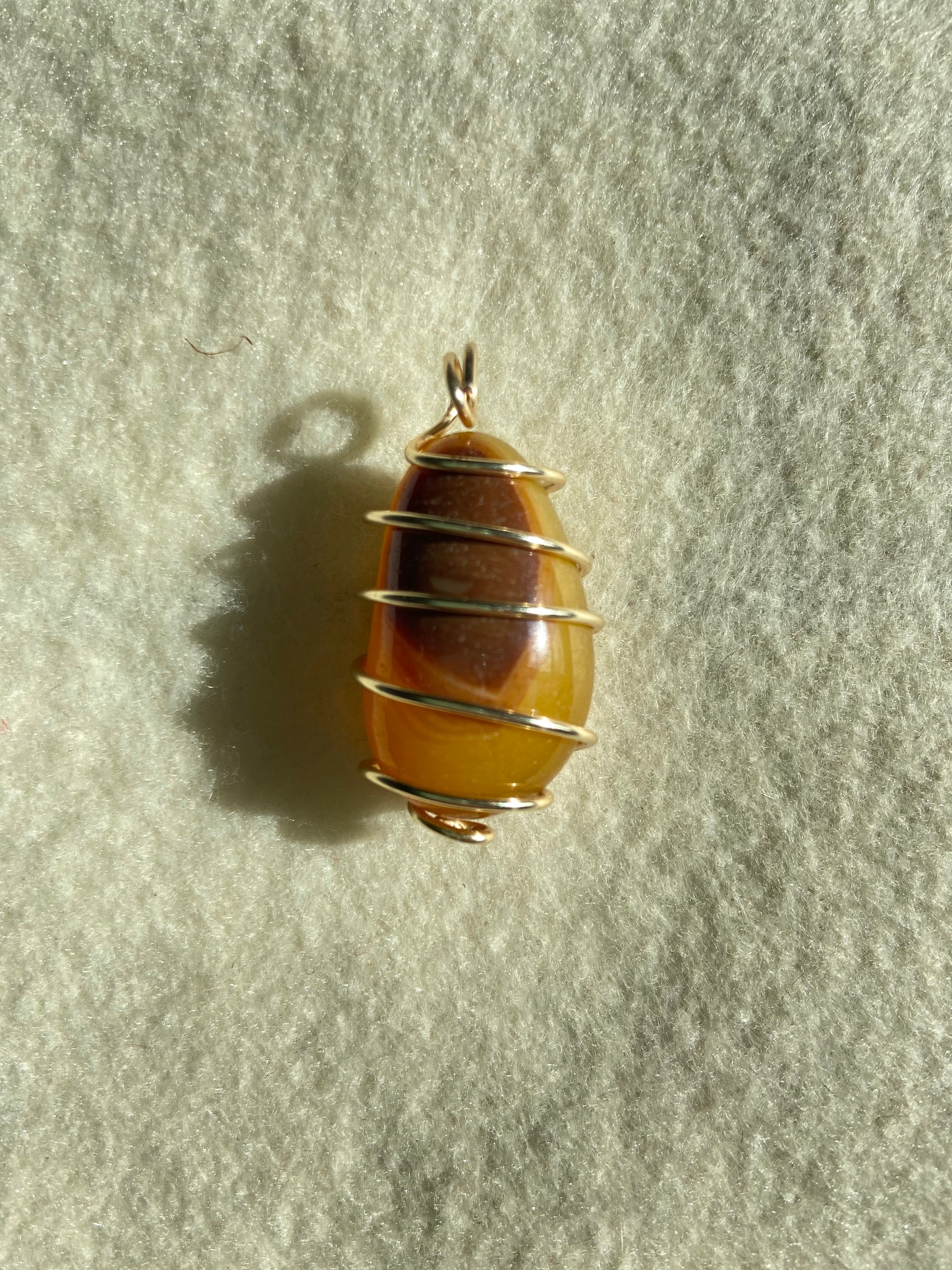 Mặt dây chuyền mật ong Onyx