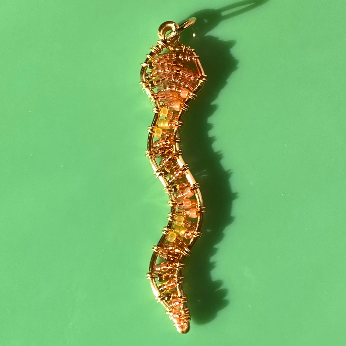 Brown Sugar Peach Snake Beaded Pendants