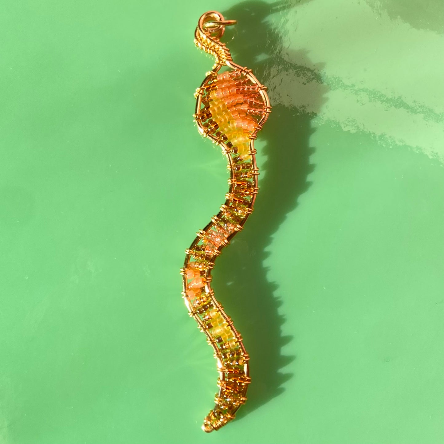 Brown Sugar Peach Snake Beaded Pendants